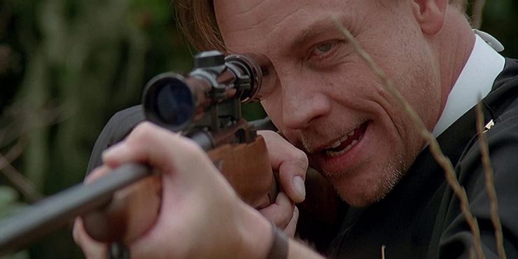 Hamill with rifle